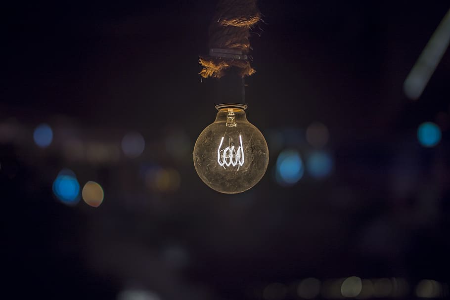 Close-up of Illuminated Light Bulb, lightbulb, no people, focus on foreground HD wallpaper