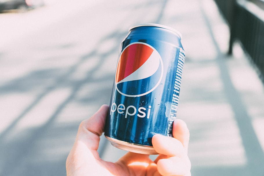 Person Holding Pepsi Can, adversting, blue, cold drink, container
