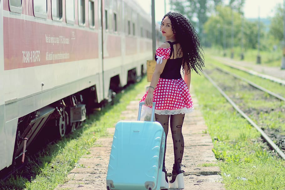 Young Woman With Luggage Standing on Train in City, adult, baggage, HD wallpaper