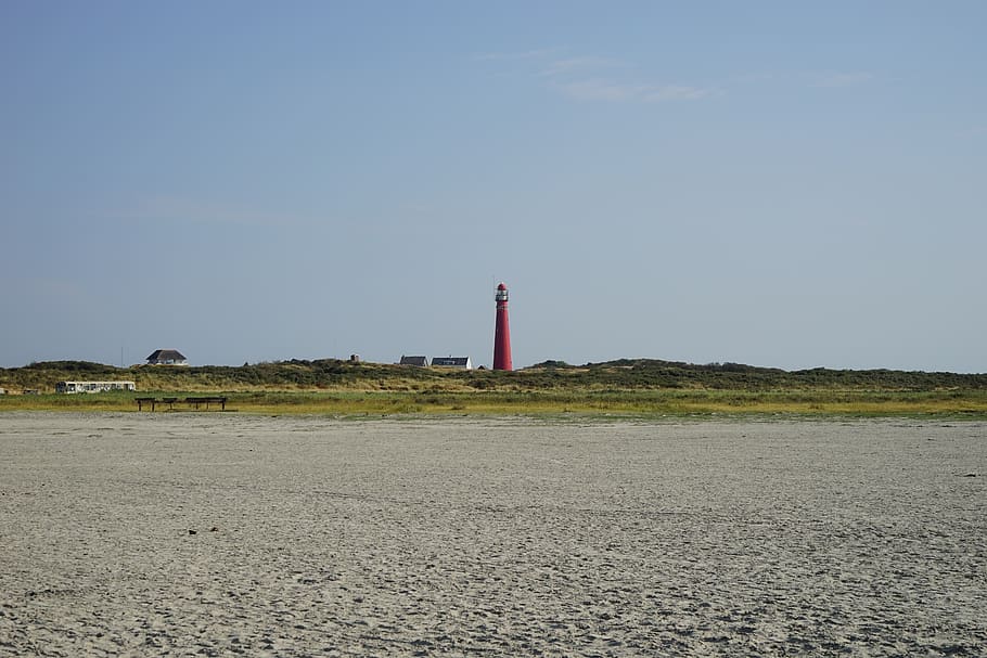 lighthouse, island, beach, vacations, sea, coast, sky, tower HD wallpaper