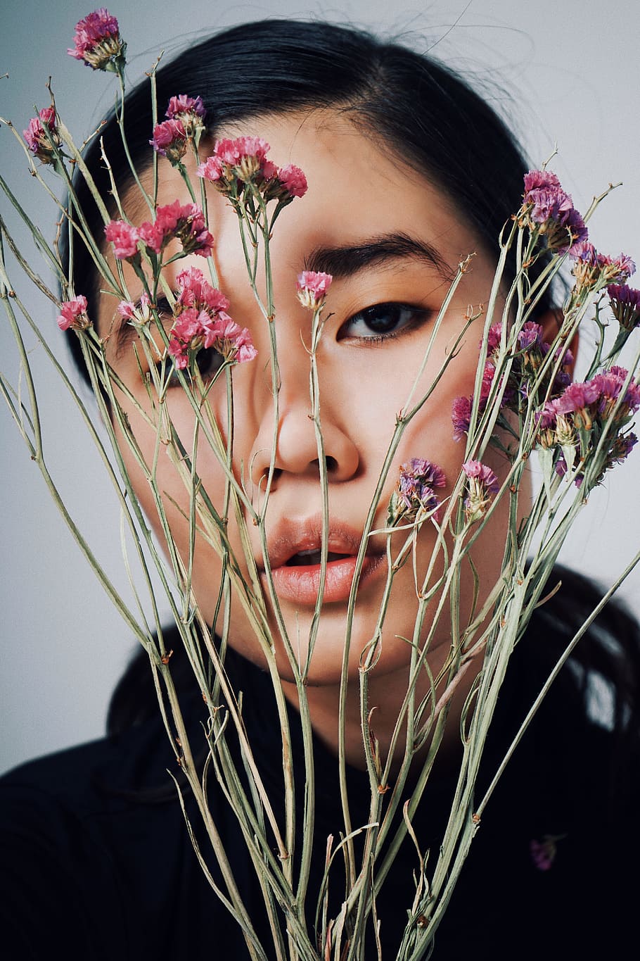 woman holding pink flowers, one person, portrait, headshot, young adult HD wallpaper