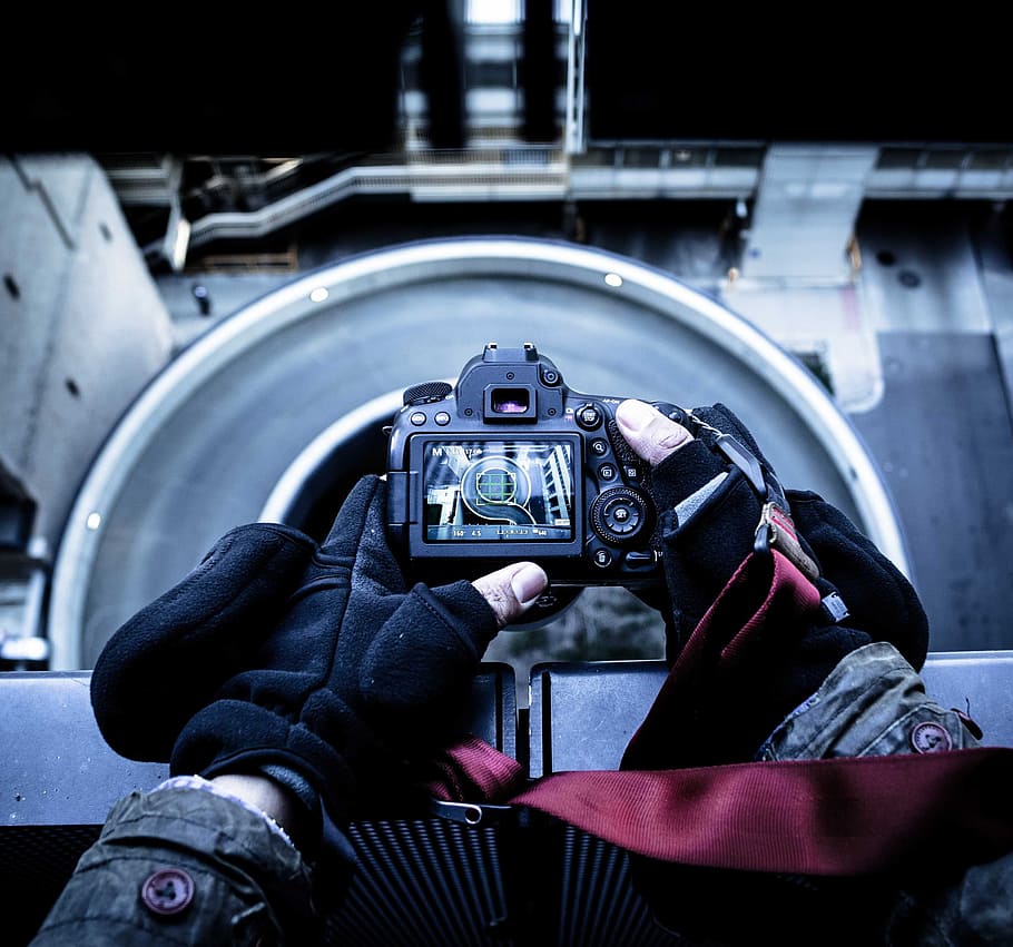 Person Holding Black Dslr Camera, capture, display, gear, hands HD wallpaper