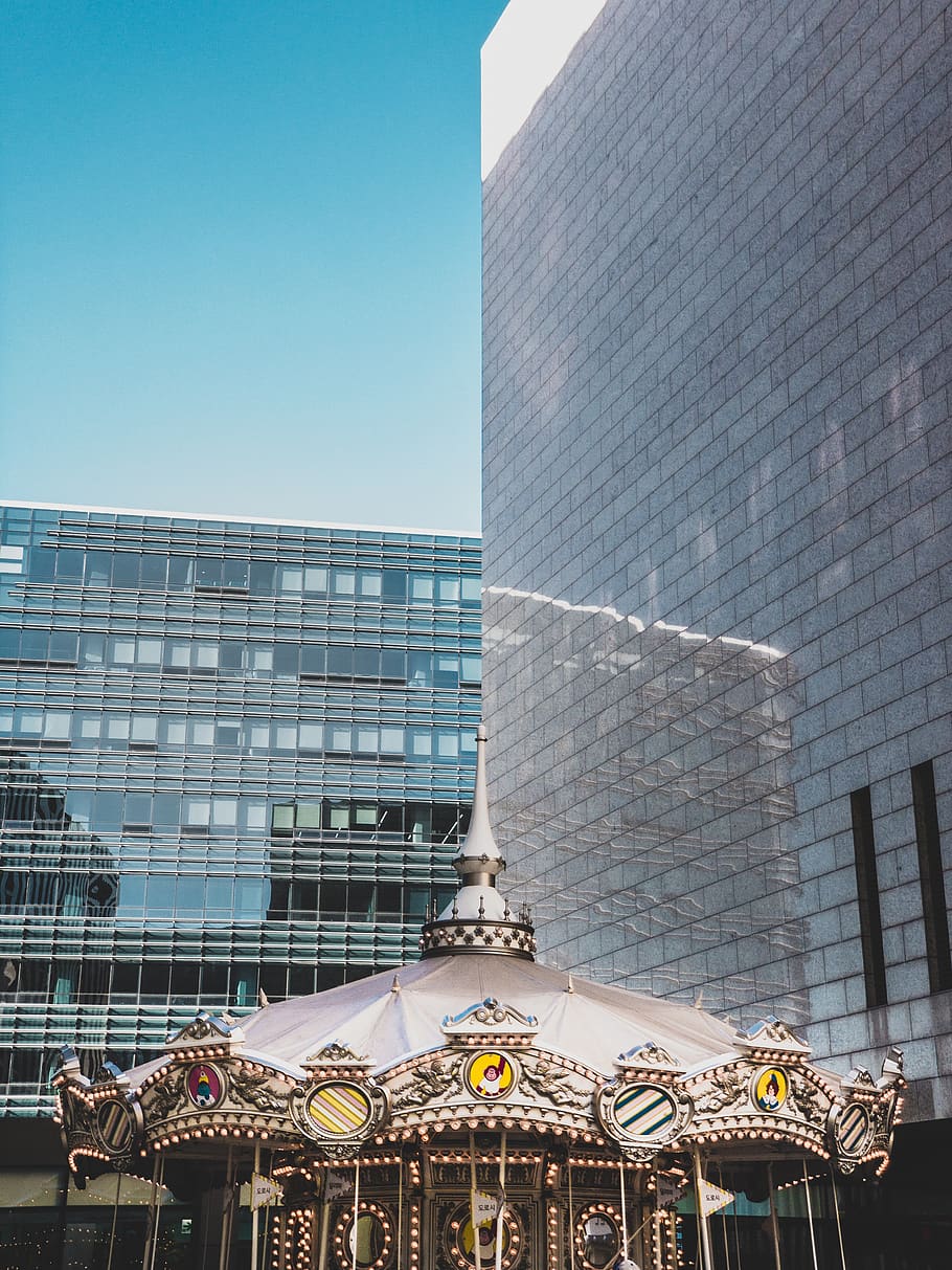 carousel near the high rise building, leisure activities, amusement park HD wallpaper
