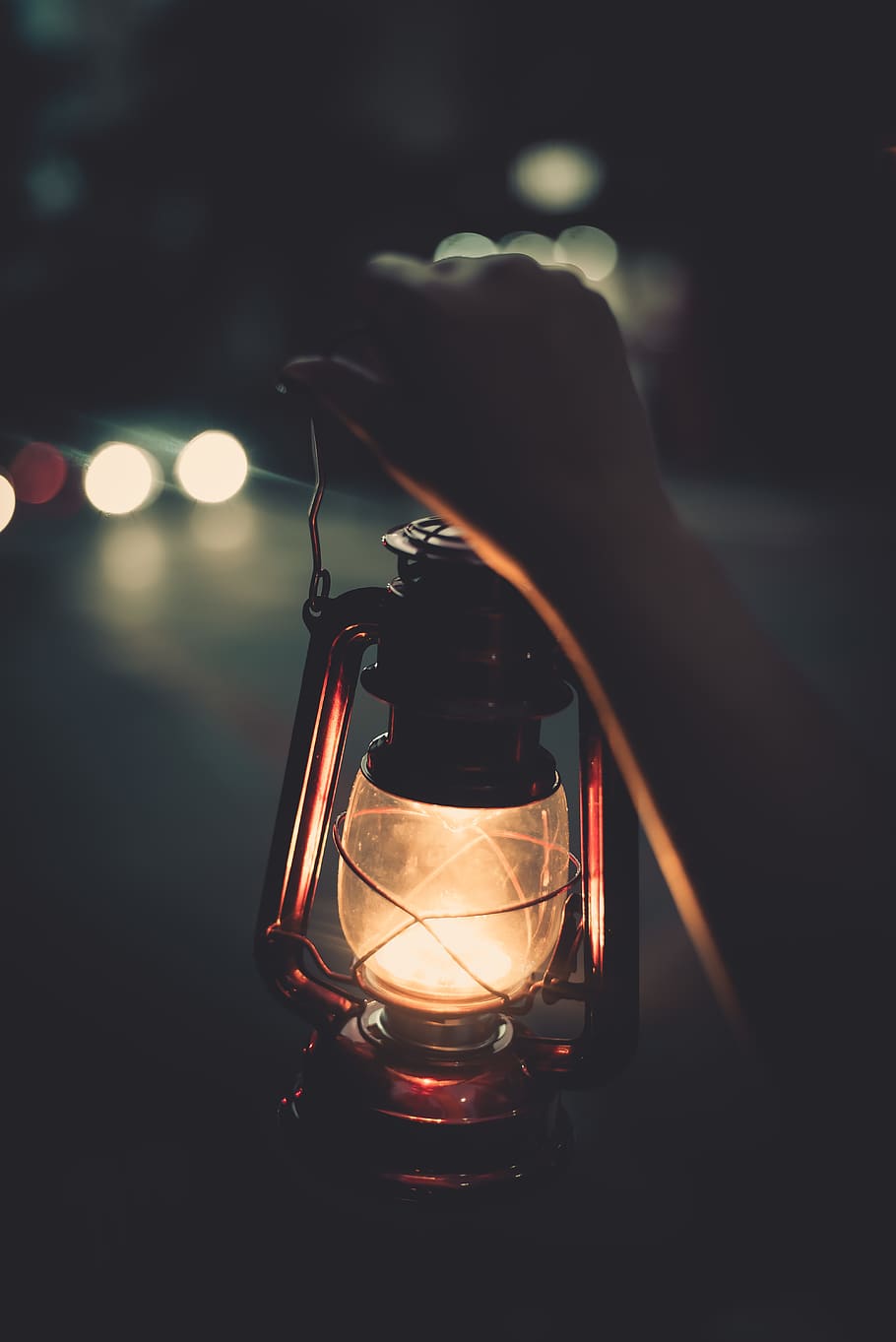 Person Holding Kerosene Lamp, illuminated, lantern, light, human hand HD wallpaper