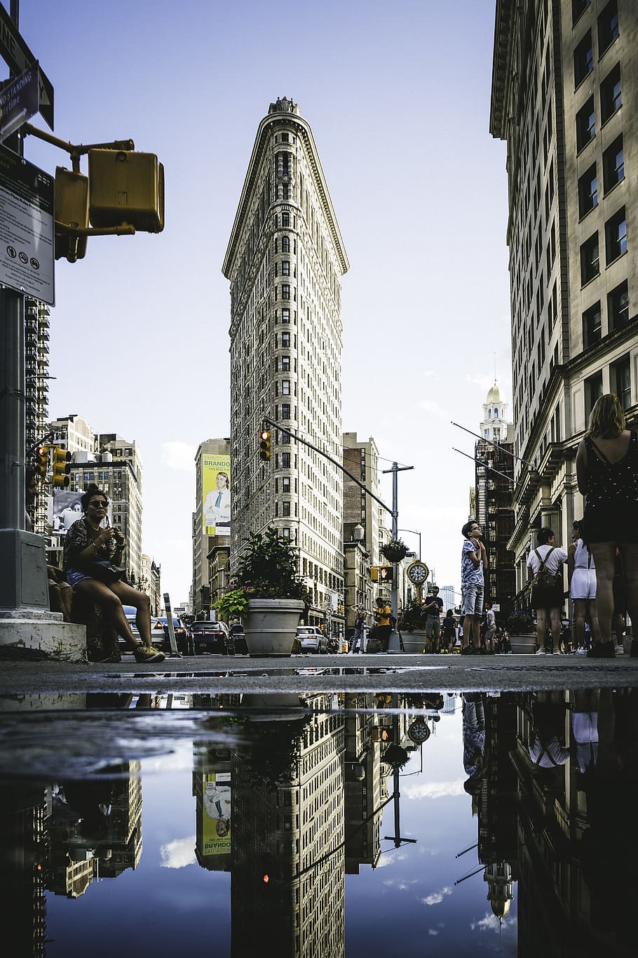 low angle photography of flatiron building, puddle, reflection HD wallpaper