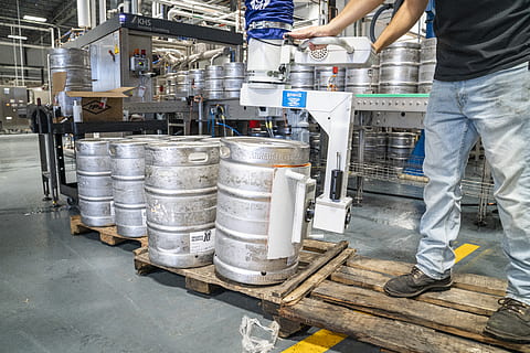 Man Operating Silver Machine for Silver Steel Kegs, barrel, beer HD wallpaper