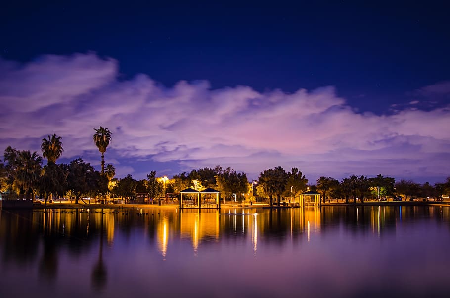 Lighted House Near Body of Water, beach, clouds, dawn, dusk, evening HD wallpaper