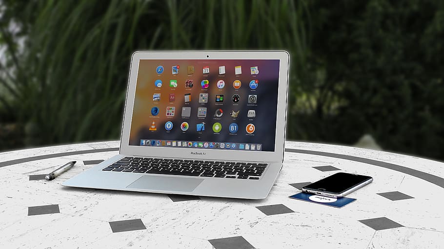 Turned-on Macbook Air on White and Gray Surface, blur, communication HD wallpaper