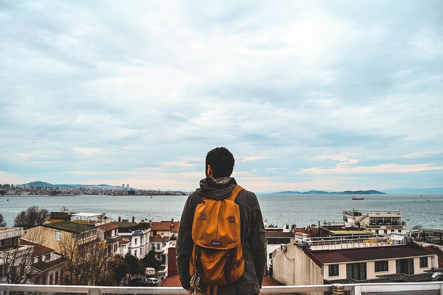 Man Wearing Black Jacket And Brown Backpack, explore, Istanbul HD wallpaper