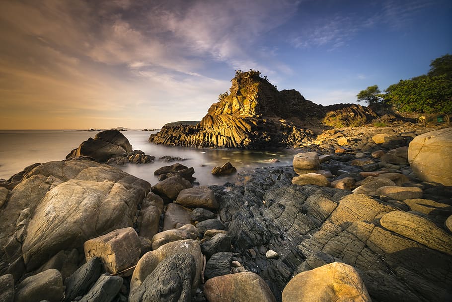 Gray Stones Near Body of Water, backlit, beach, clouds, dawn HD wallpaper