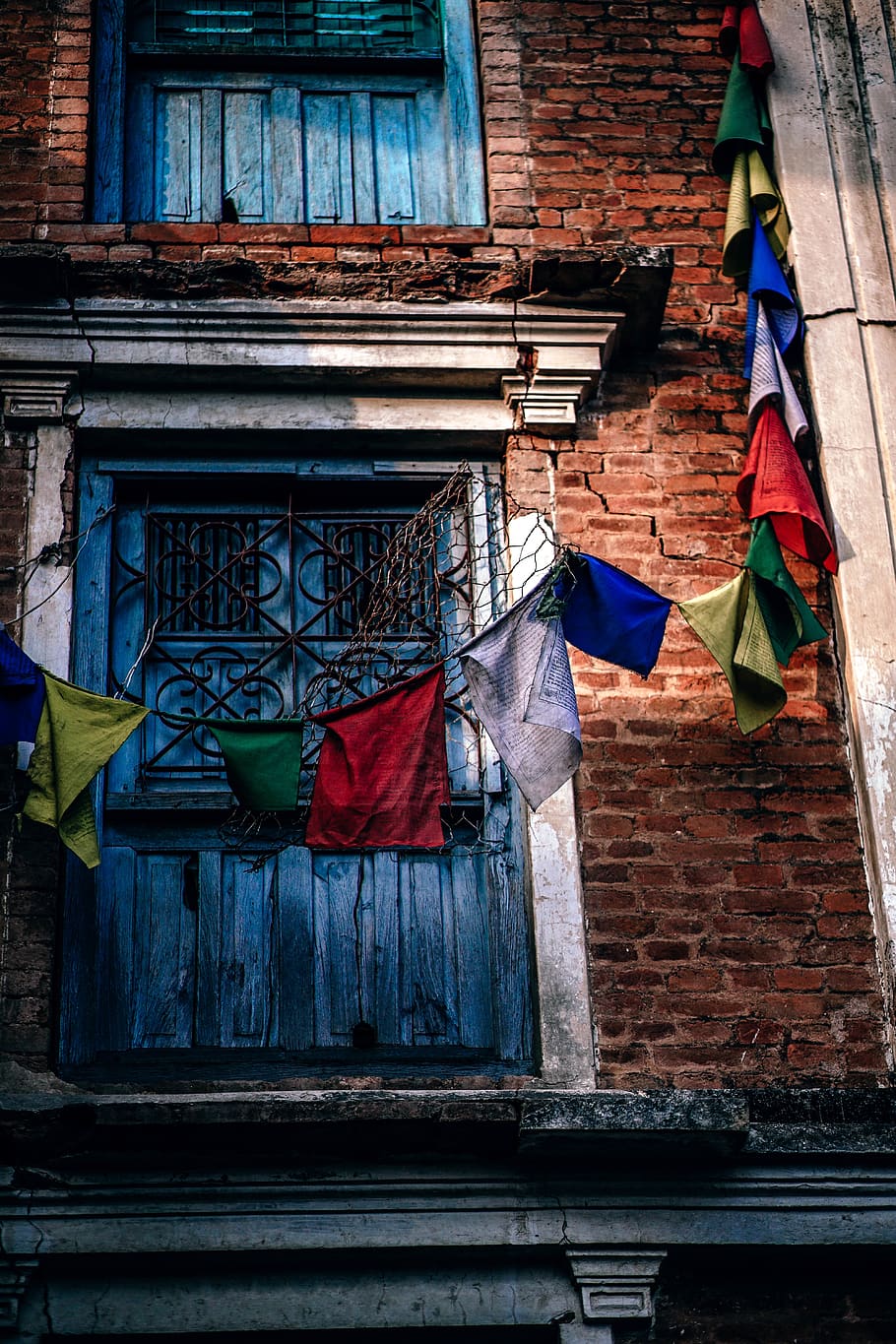 Assorted-color Buntings in Front of Building, architecture, bricks HD wallpaper