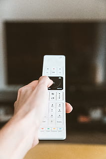 White and Black Remote Control, hand, portable, human hand, one person HD wallpaper