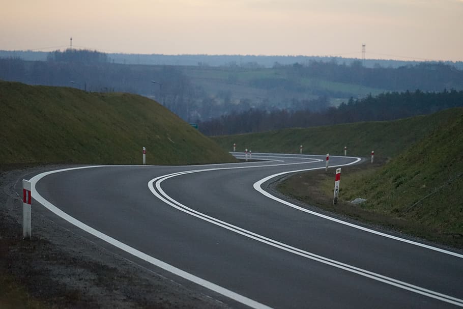 road, curves, dawn, transportation, sign, sky, road marking HD wallpaper