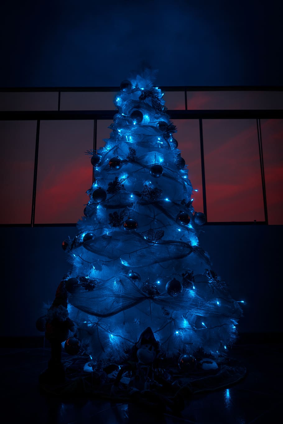 christmas tree in dim light, plant, ornament, peru, fuego en el cielo y luces de navidad