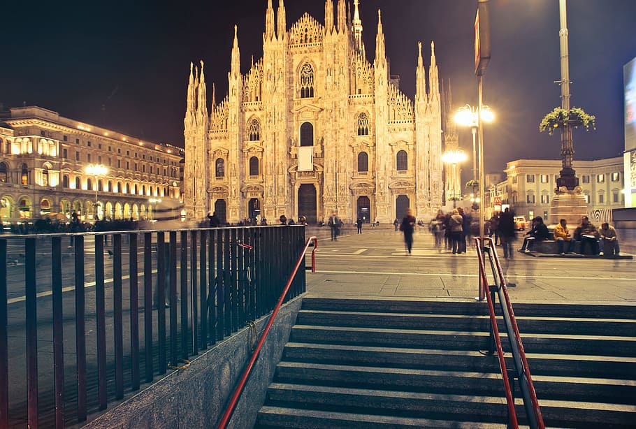 Milan Cathedral exterior shining in the lights, architectural