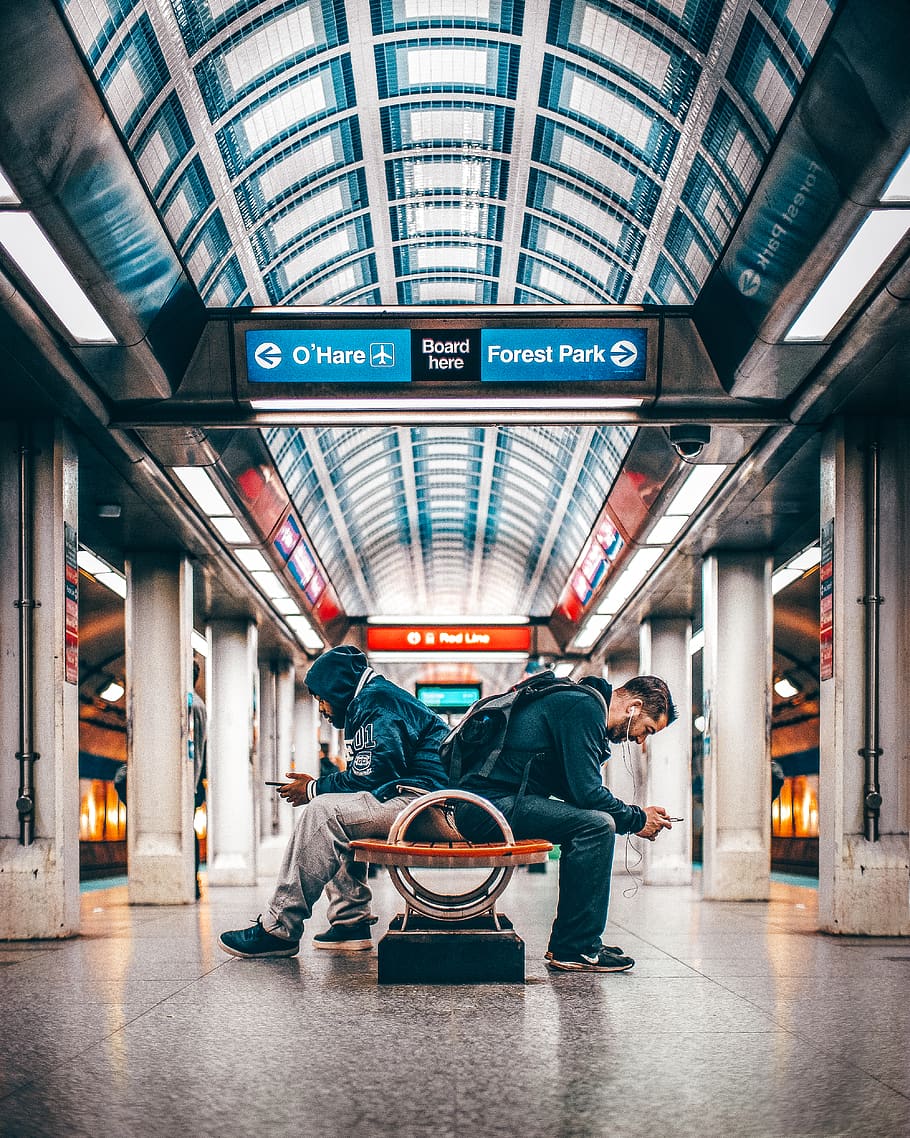 Two Men Sitting On Bench Inside A Station, airport, architecture HD wallpaper