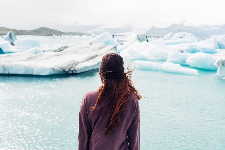 Woman Wearing Purple Shirt Overlooking at Body of Water and Snow Covered Field HD wallpaper