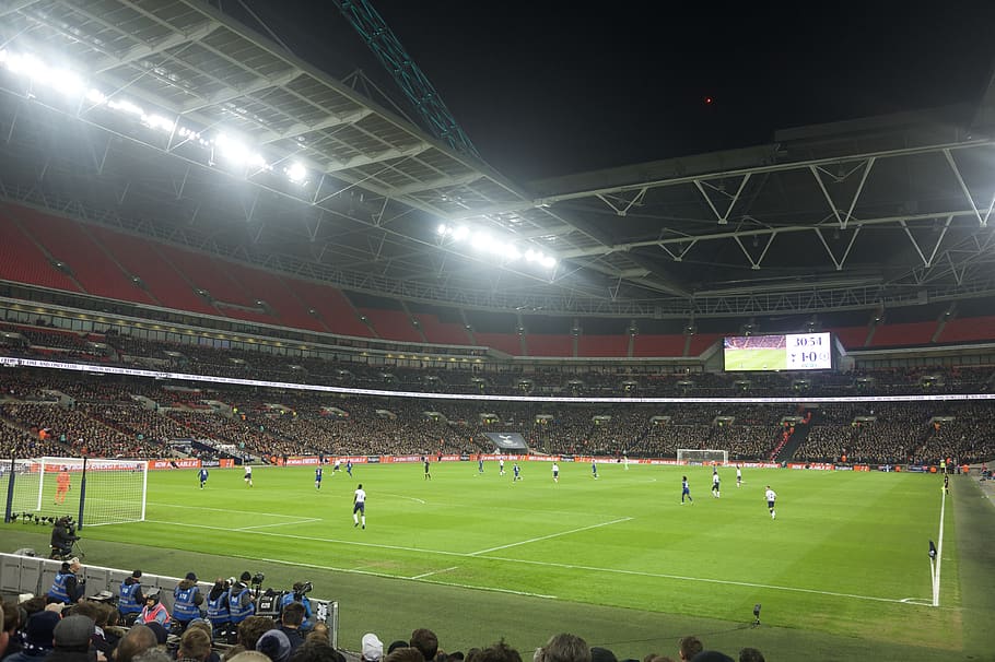 people playing football, stadium, building, human, person, arena