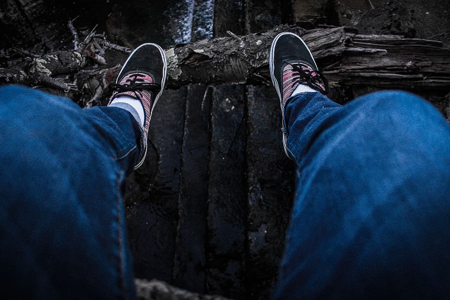 Person Wearing Blue Denim Jeans Above Black Surface, cliff, dam HD wallpaper
