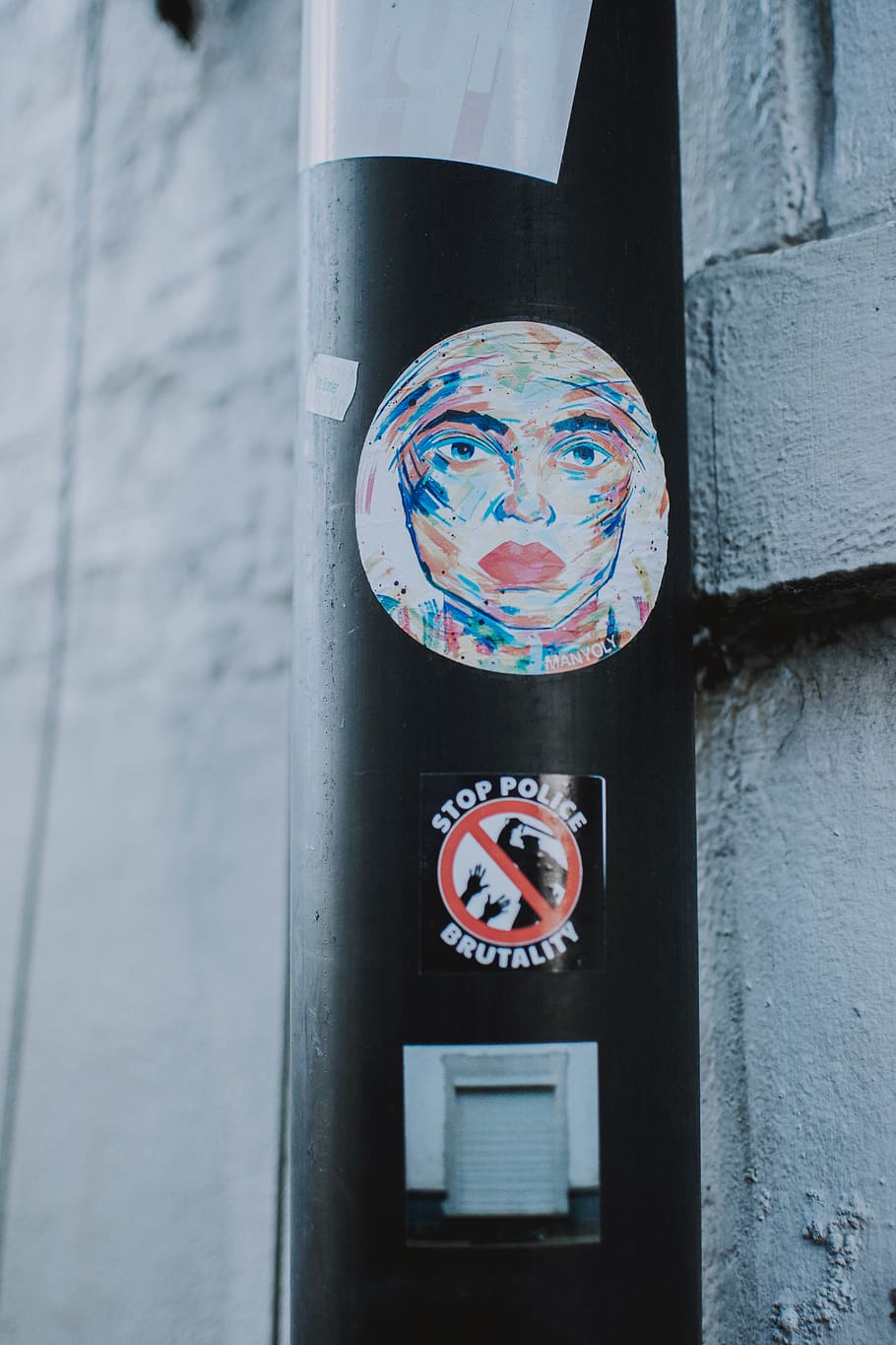 Black Tube With Sticker of Woman, art, exterior, iron, post, steel HD wallpaper