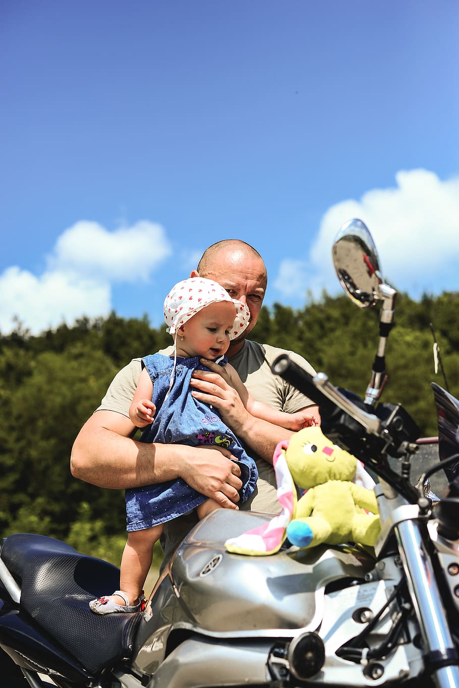 Man Holding Toddler , biker, child, kid, people, vehicle, young HD wallpaper