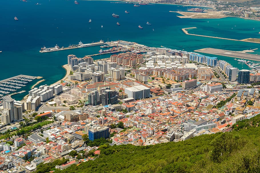 city by the beach at daytime, harbor, sea, view, gibraltar, building exterior