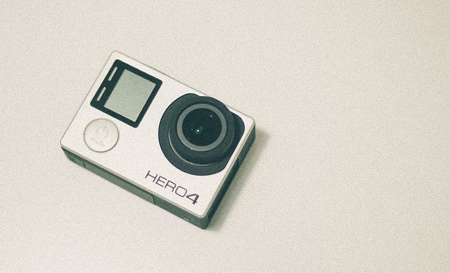 A GoPro Hero4 camera sitting on a white surface., vietnam, ho chi minh city, HD wallpaper