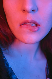 woman biting lips, one person, front view, real people, human body part HD wallpaper