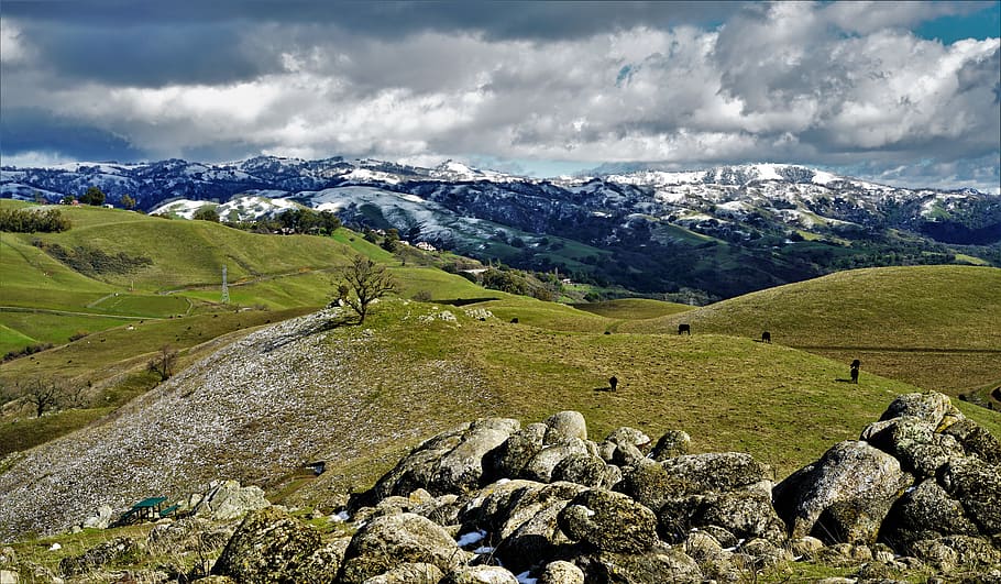 grass covered hills under cloudy sky, rubble, nature, outdoors HD wallpaper