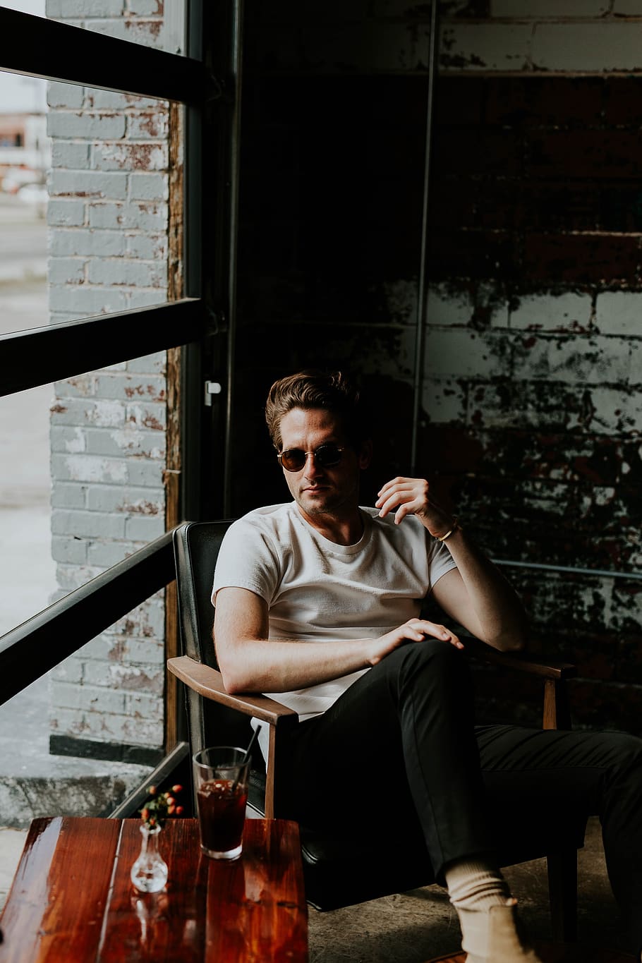 people, man, guy, sitting, wooden, table, sunglasses, flower HD wallpaper