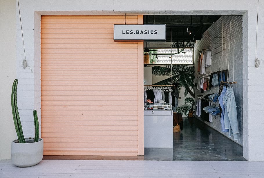 assorted-color clothes lot, building, shop, store, shutter, doorway HD wallpaper
