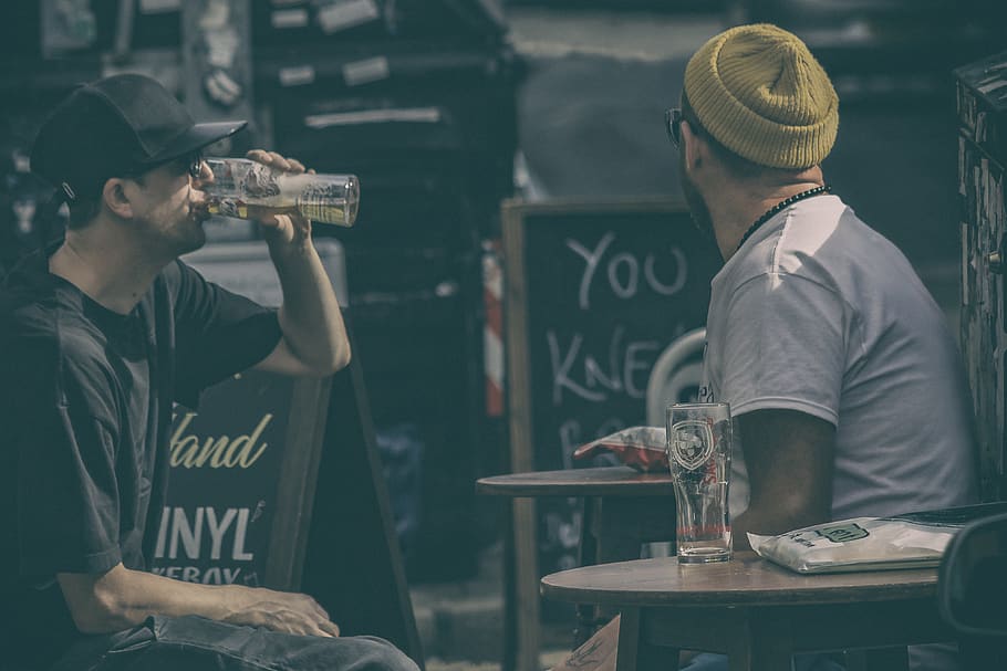 two men drinking beers, real people, food and drink, cap, two people HD wallpaper