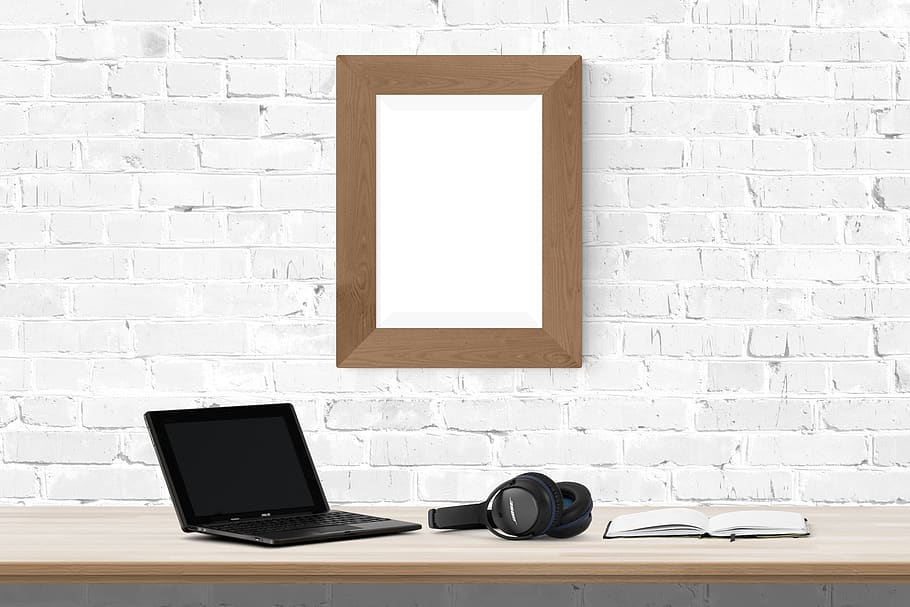 poster, frame, desk, laptop, book, headphone, brick wall, technology HD wallpaper