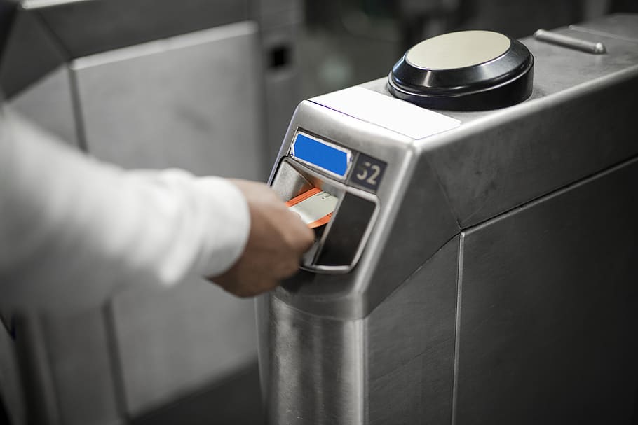Person Inserting Card In Machine, commute, commuter, commuting HD wallpaper