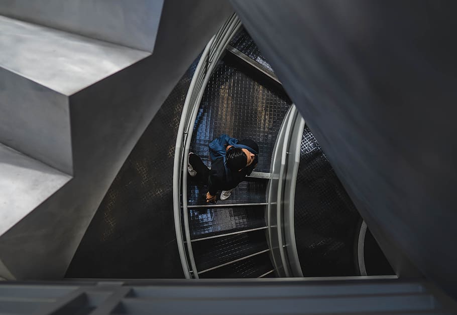 man walking on spiral stairs, child, railing, staircase, kid HD wallpaper