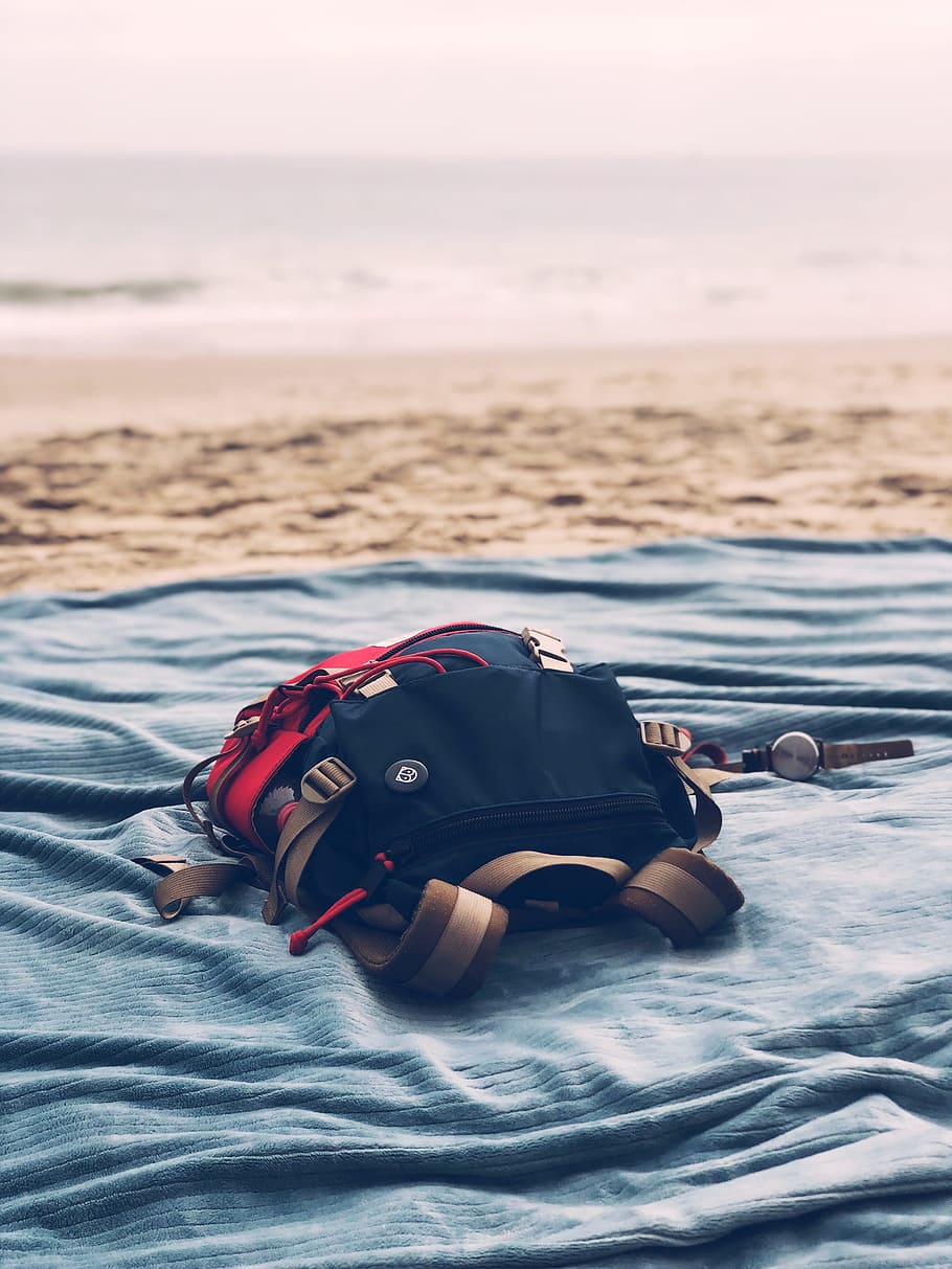 black bag on gray textile near seashore, summer, hiking, backpack HD wallpaper