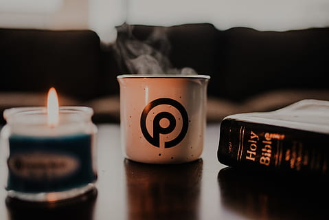white ceramic cup on brown table, book, candle, bible, read, faith HD wallpaper