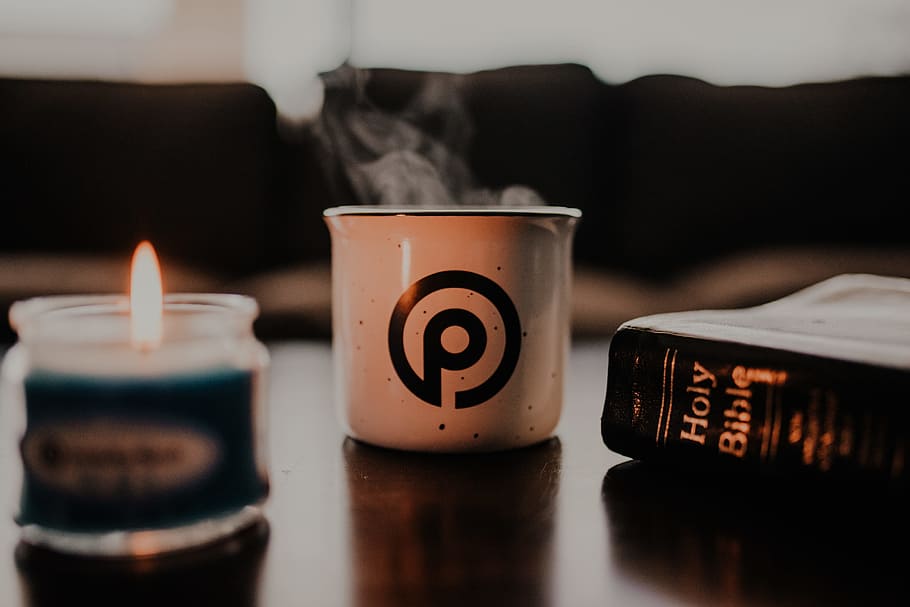 white ceramic cup on brown table, book, candle, bible, read, faith HD wallpaper