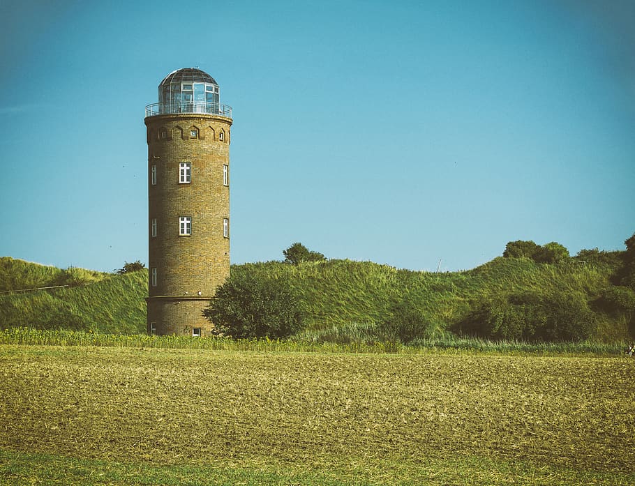 lighthouse, coast, blue sky, landmark, sea, ocean, plant, field HD wallpaper