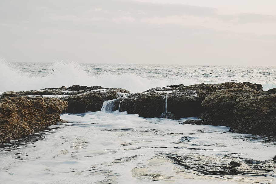 Photo of Rocks On Ocean, beach, environment, horizon, nature HD wallpaper