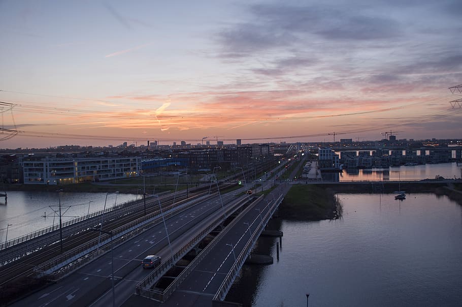 sunset, bridge, amsterdam, architecture, water, city, evening HD wallpaper