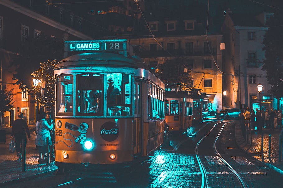 Photo of People Riding on City Tram, architecture, automobiles
