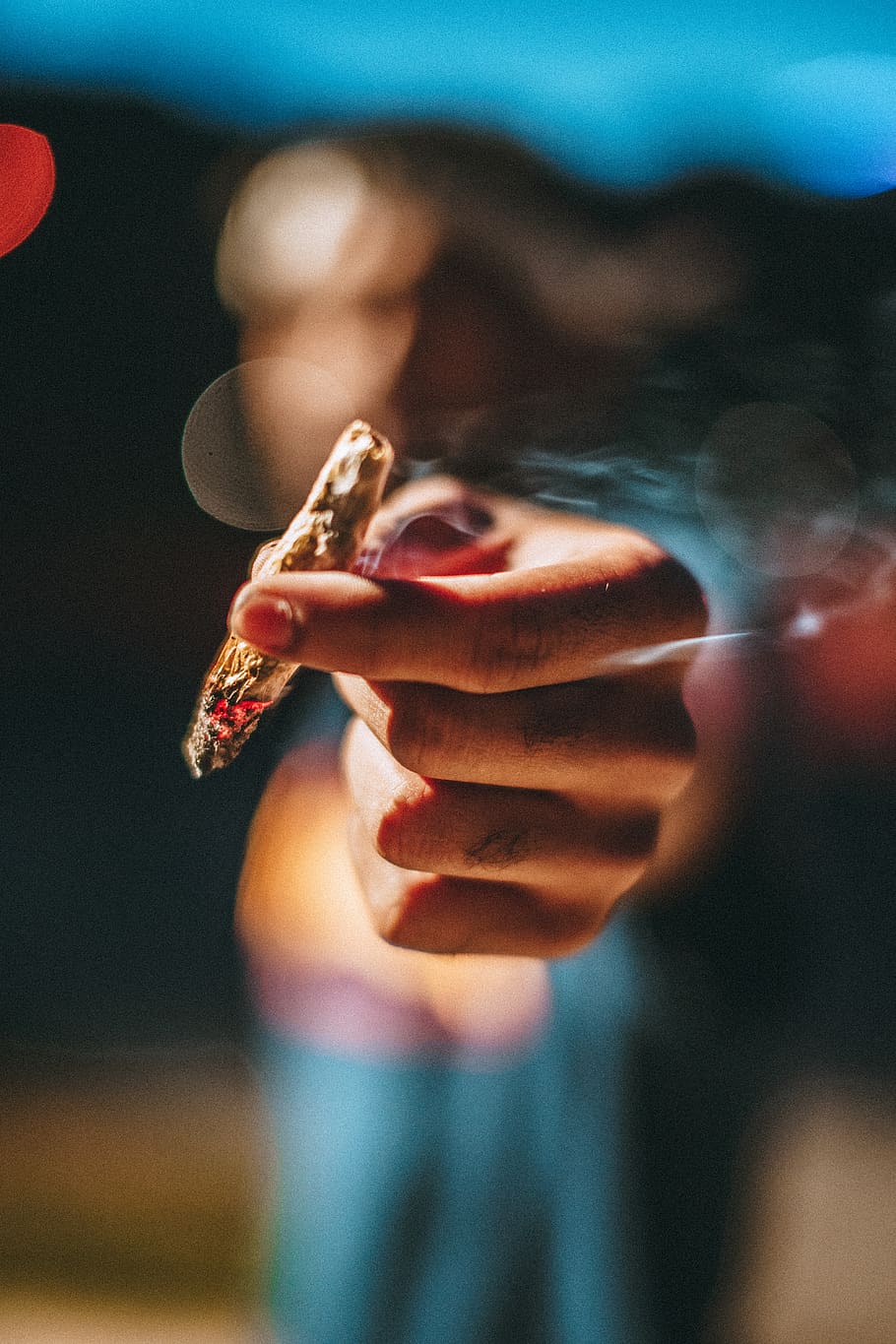 person holding lighted joint, one person, real people, human hand HD wallpaper