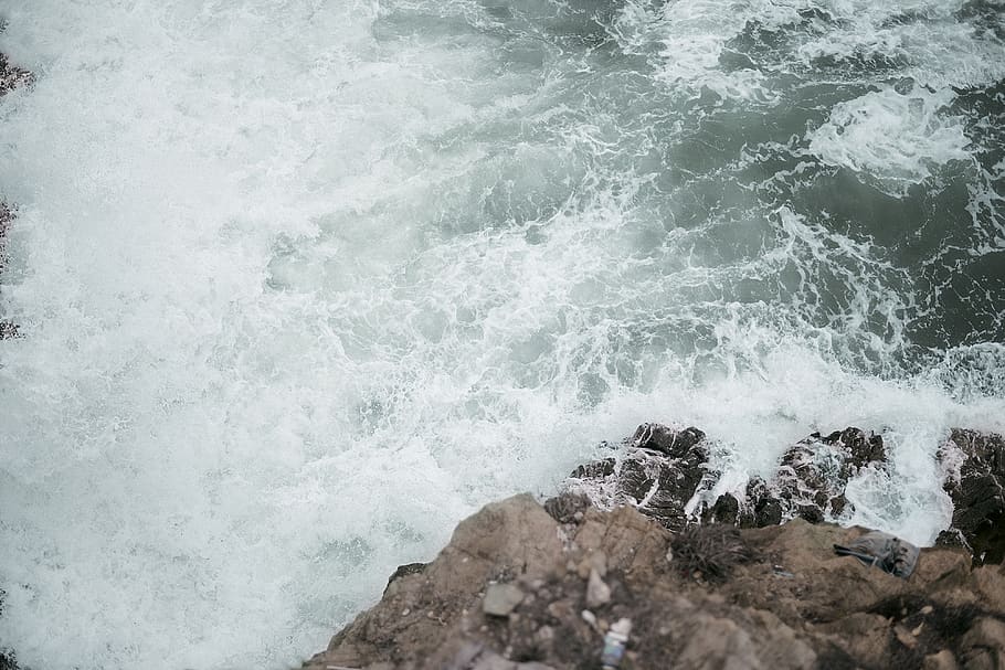 ocean waves on rock formation, sea, nature, water, outdoors, sea waves HD wallpaper