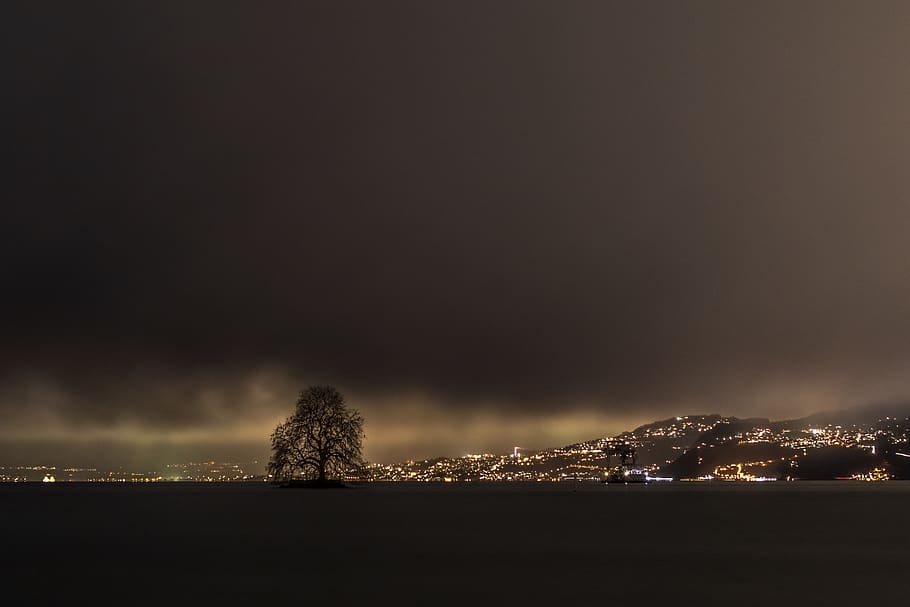 grey clouds hovering above the city, night, sky, scenics - nature HD wallpaper