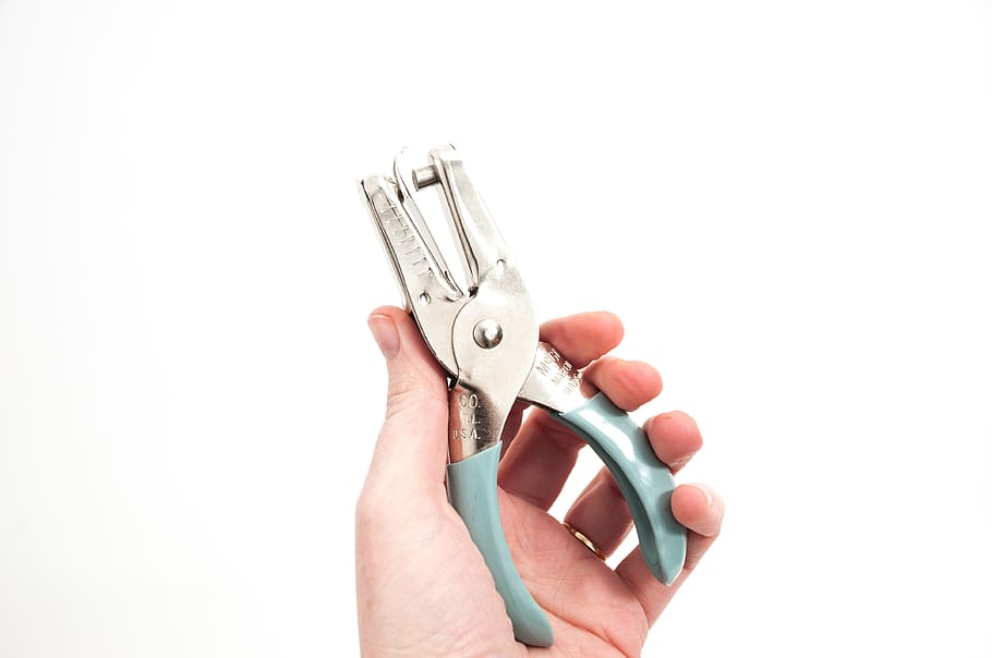 person holding gray cutting tools, hand, human body part, human hand HD wallpaper