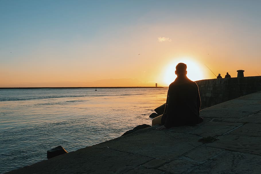sunset, sea, lake, sky, sitting, real people, lifestyles, water HD wallpaper