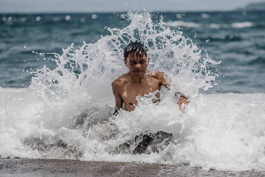 Boy Swimming on Sea, action, beach, daylight, fun, leisure, man HD wallpaper
