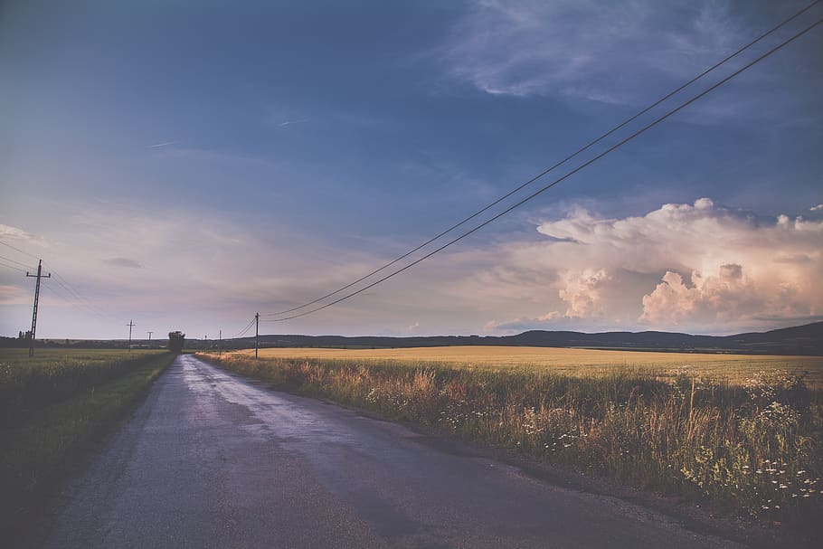 Concrete Road Between Grass Fields, clouds, cloudy, country, dawn HD wallpaper