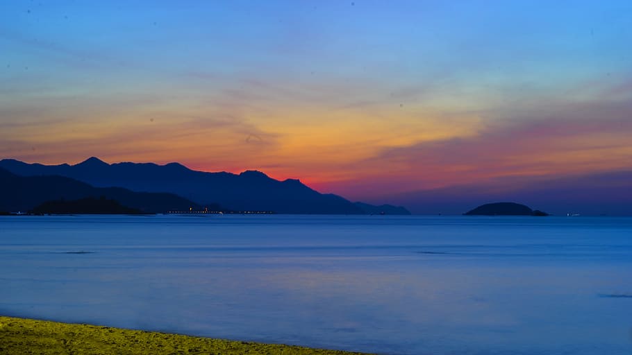 Photo of Ocean Apart from Mountain, beach, blue mountains, dawn HD wallpaper